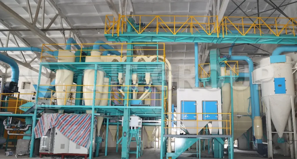 Close-up of the edible oil pretreatment workshop: Vibrating screen, crusher, and flaking machine working together
