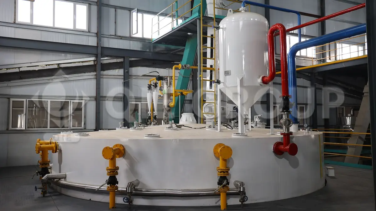 Rotocel extractor used for continuous solvent extraction of oilseeds, improving oil yield and reducing residual oil in meal.