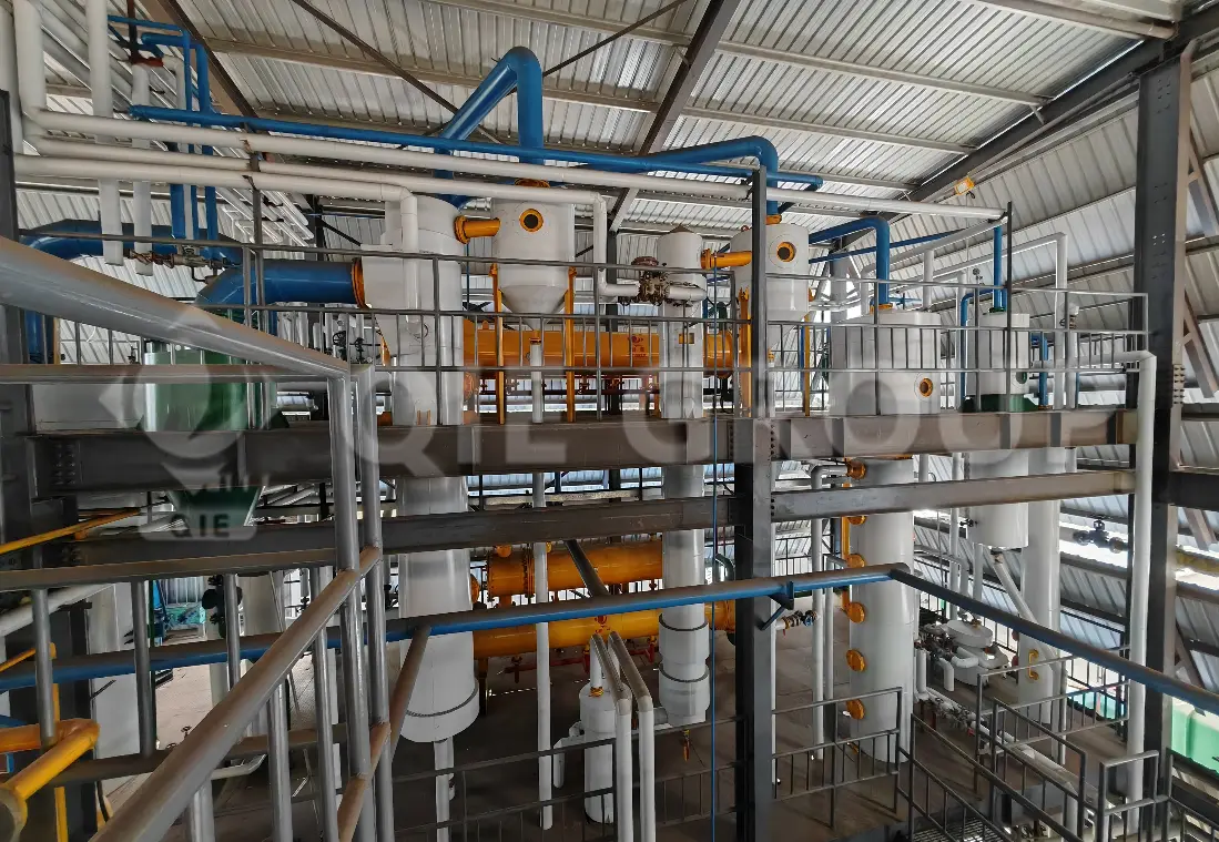 Copra oil extraction workshop showing drag chain extractor and solvent extraction system