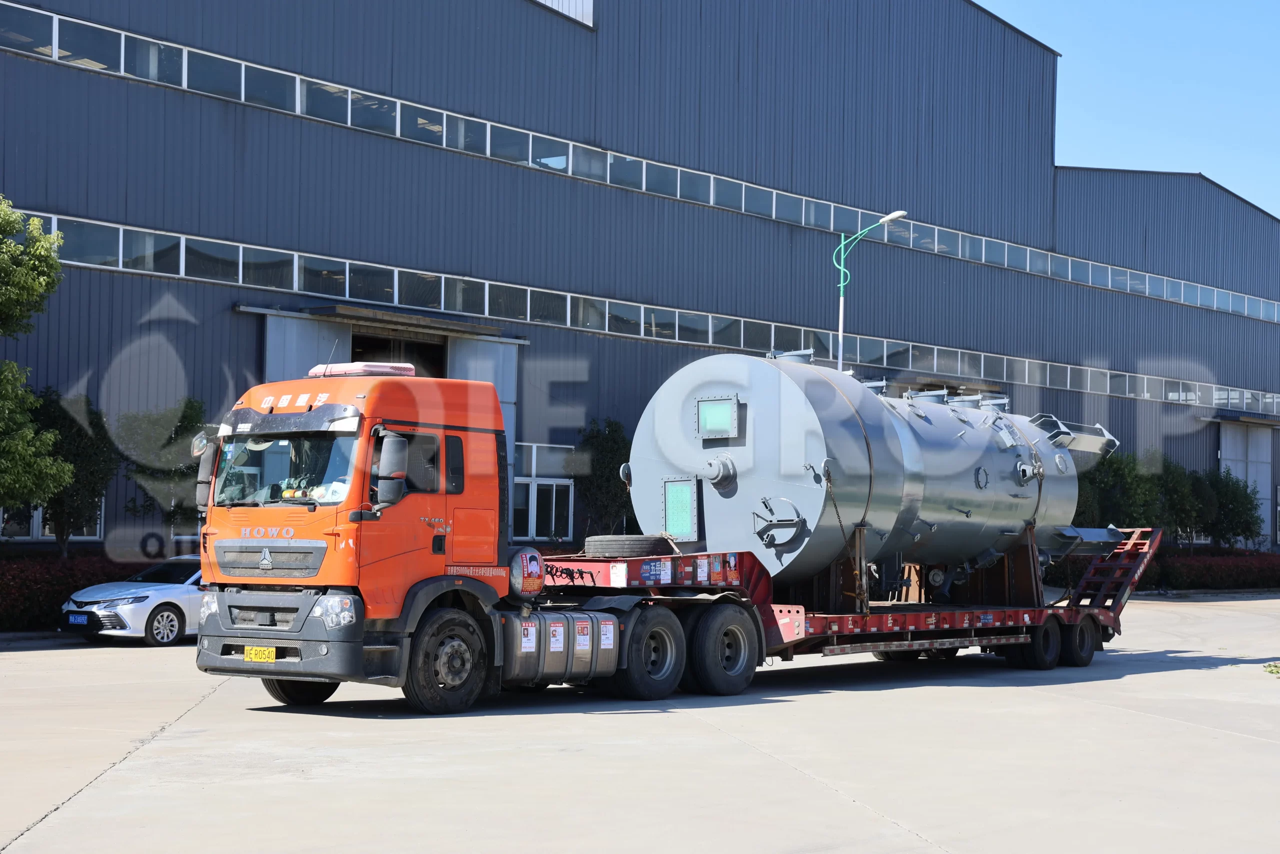 Edible oil processing equipment being loaded for shipment to overseas project site