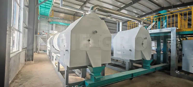 Automated peanut roasting system for pre-treatment in peanut oil processing plant